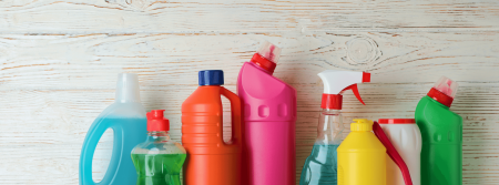 home care cleaning products grouped together against a wall