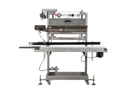 Horizontal gas flush sealer machine