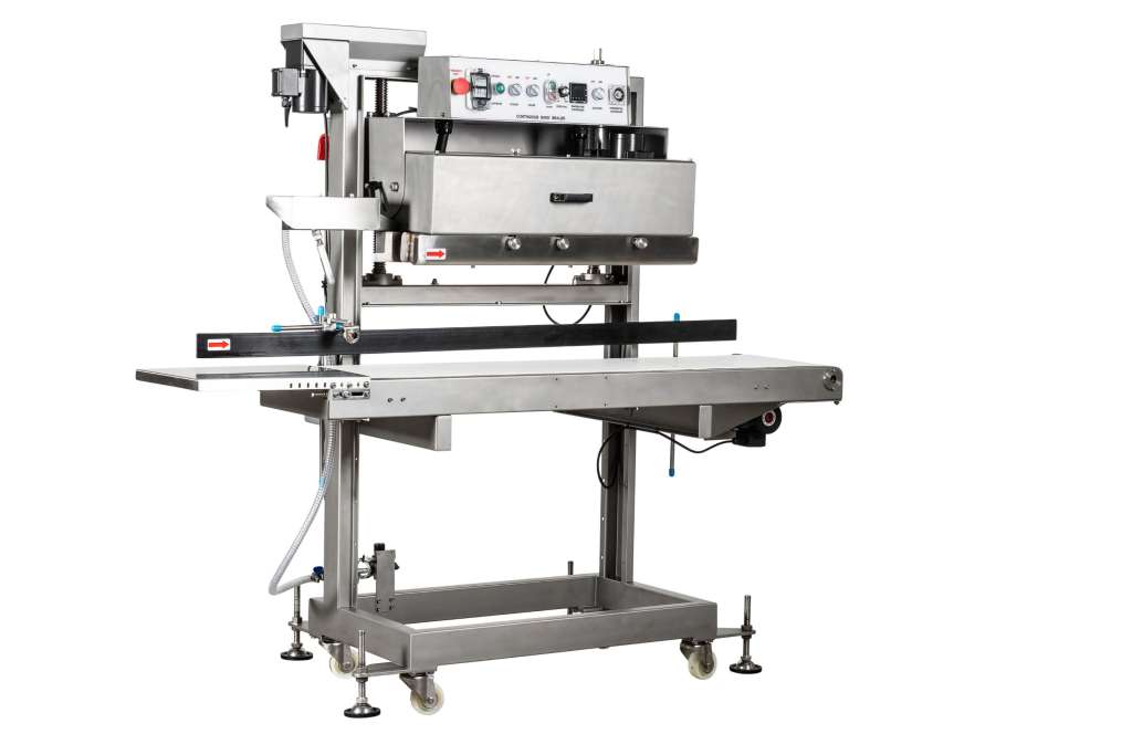Horizontal gas flush continuous band sealer