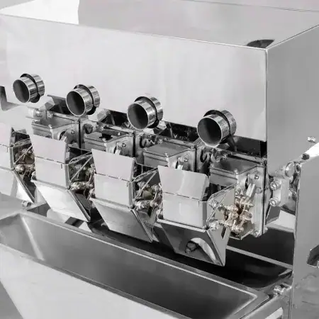 4 head linear weighing machine close up of sections