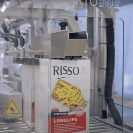Ecopack Hot Melt Bag in box machine close up of Risso box